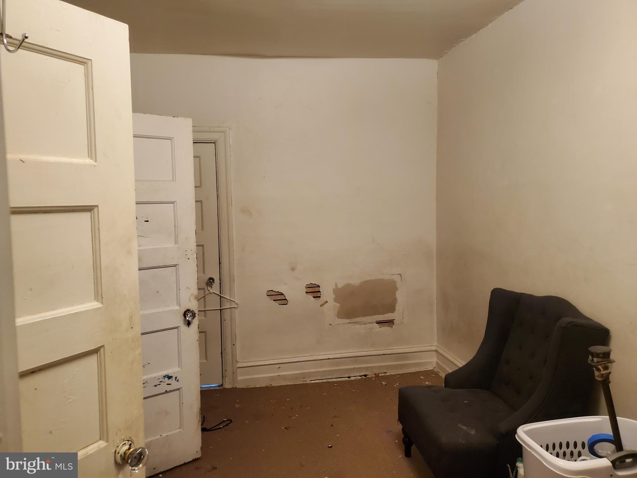 6058 Webster Street Philadelphia, PA 19143 - Photo 10 of 15 a bathroom with a granite countertop sink