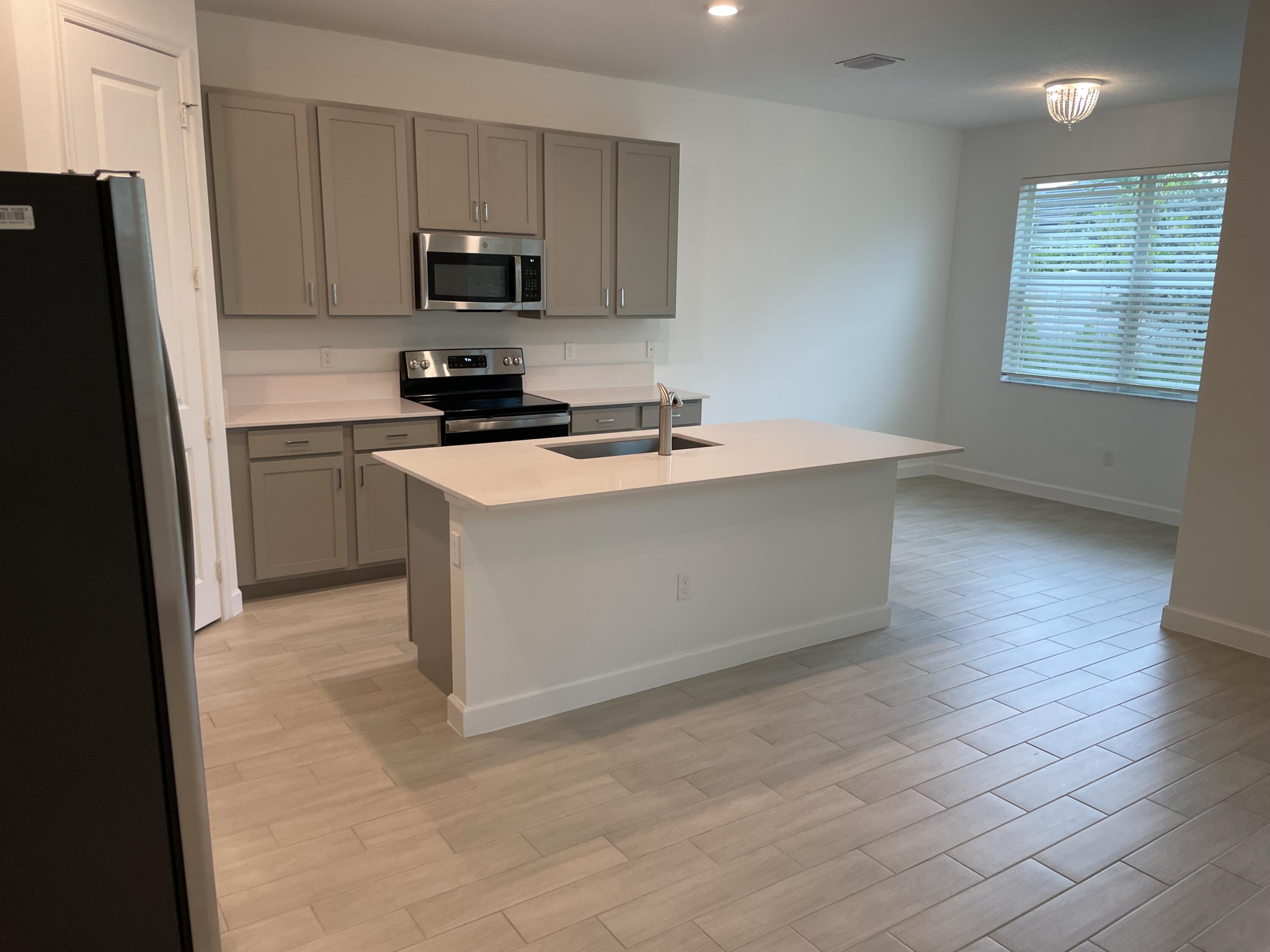 4981 Navali Drive Lake Worth, FL 33467 - Photo 5 of 37 IMG_4761