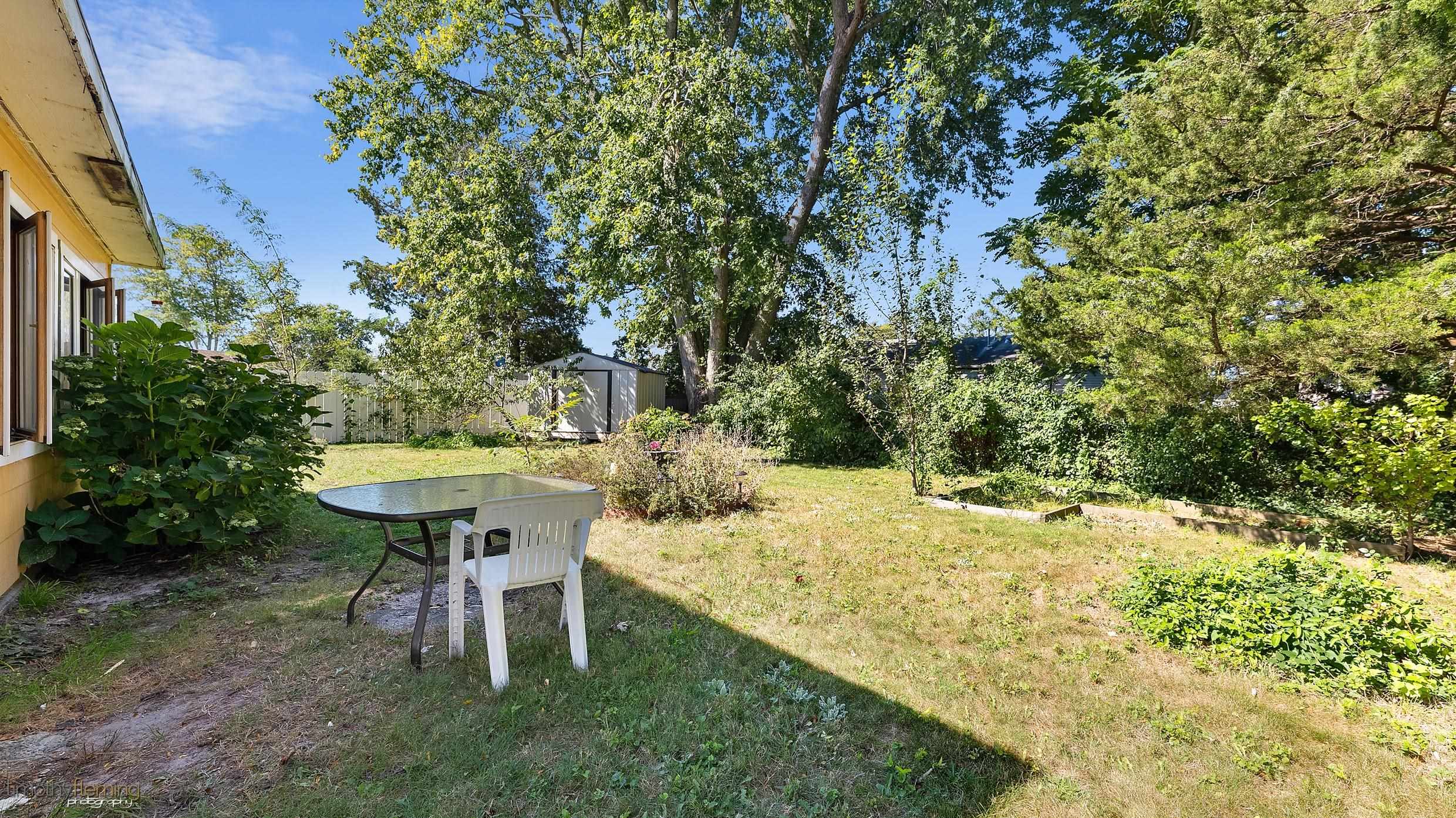 7 North 4th Street Rio Grande, NJ 08242 - Photo 17 of 20 a view of a backyard with table and chairs