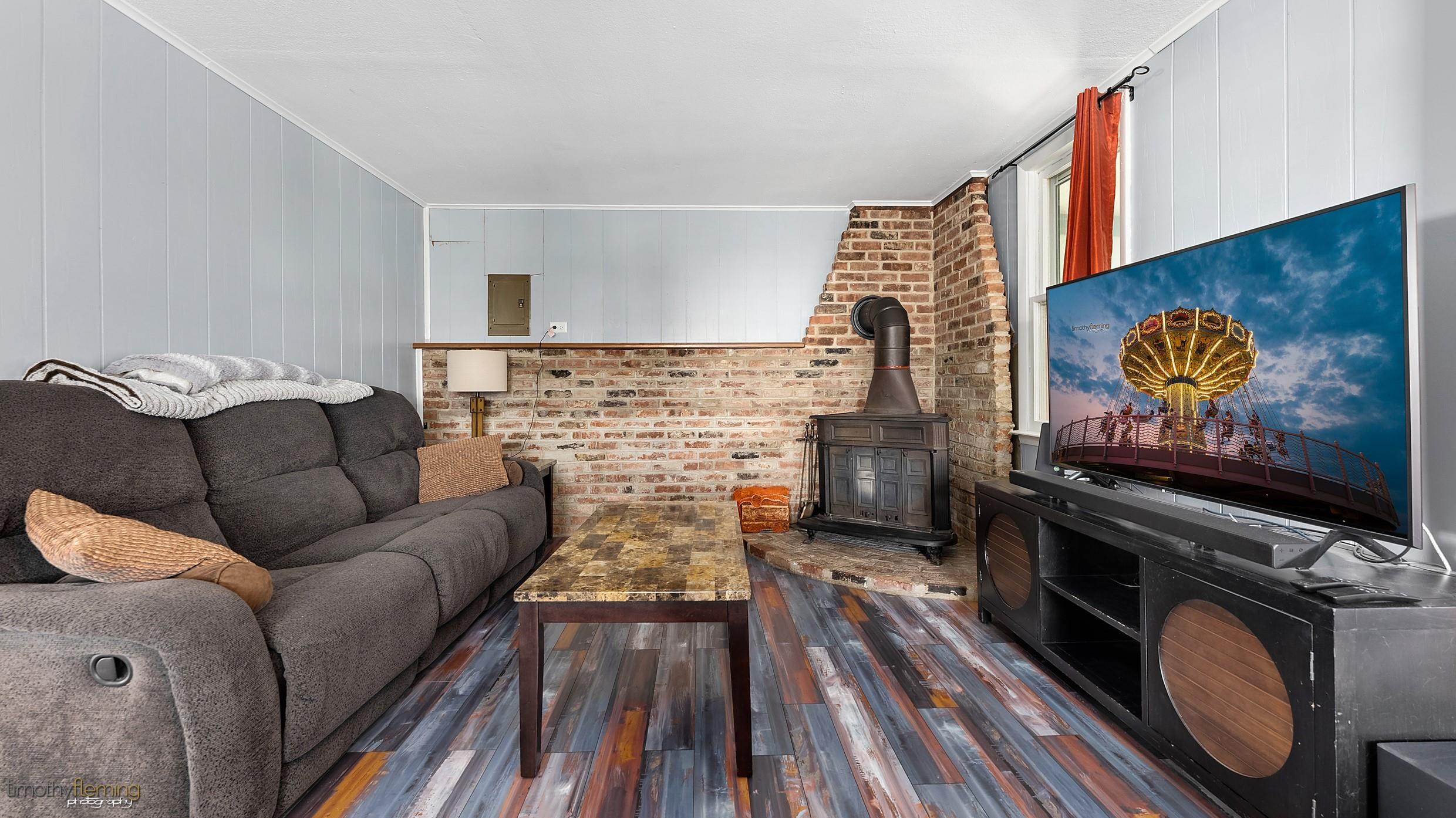 7 North 4th Street Rio Grande, NJ 08242 - Photo 7 of 20 a living room with furniture flat screen tv and a fireplace