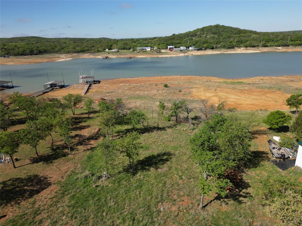 101 Overlook Drive Cisco, TX 76437 - Photo 9 of 10 a view of a lake with houses in the back
