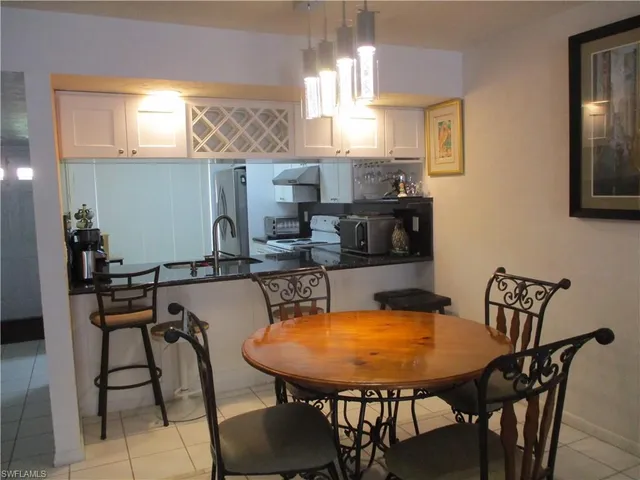 a view of a dining room with furniture