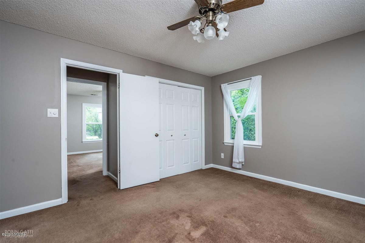 243 Lake Joy Road Perry, GA 31069 - Photo 13 of 29 a view of an empty room with a window