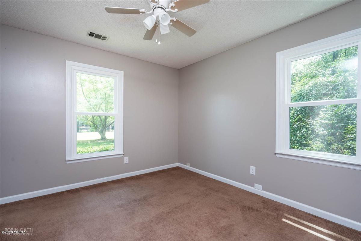 243 Lake Joy Road Perry, GA 31069 - Photo 18 of 29 a view of an empty room with a window