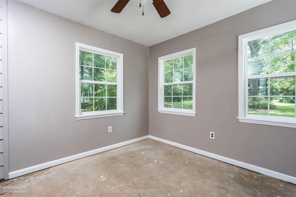 243 Lake Joy Road Perry, GA 31069 - Photo 21 of 29 an empty room with a window