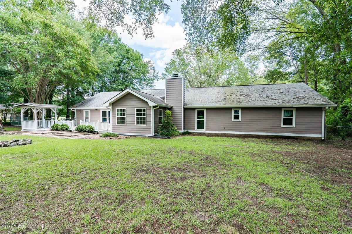243 Lake Joy Road Perry, GA 31069 - Photo 28 of 29 a front view of house with yard and green space