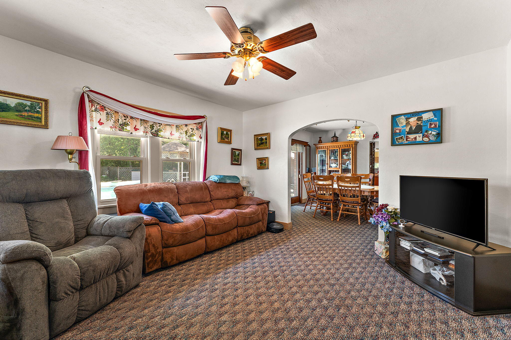 138 McClung Road La Porte, IN 46350 - Photo 17 of 50 a living room with furniture and a flat screen tv