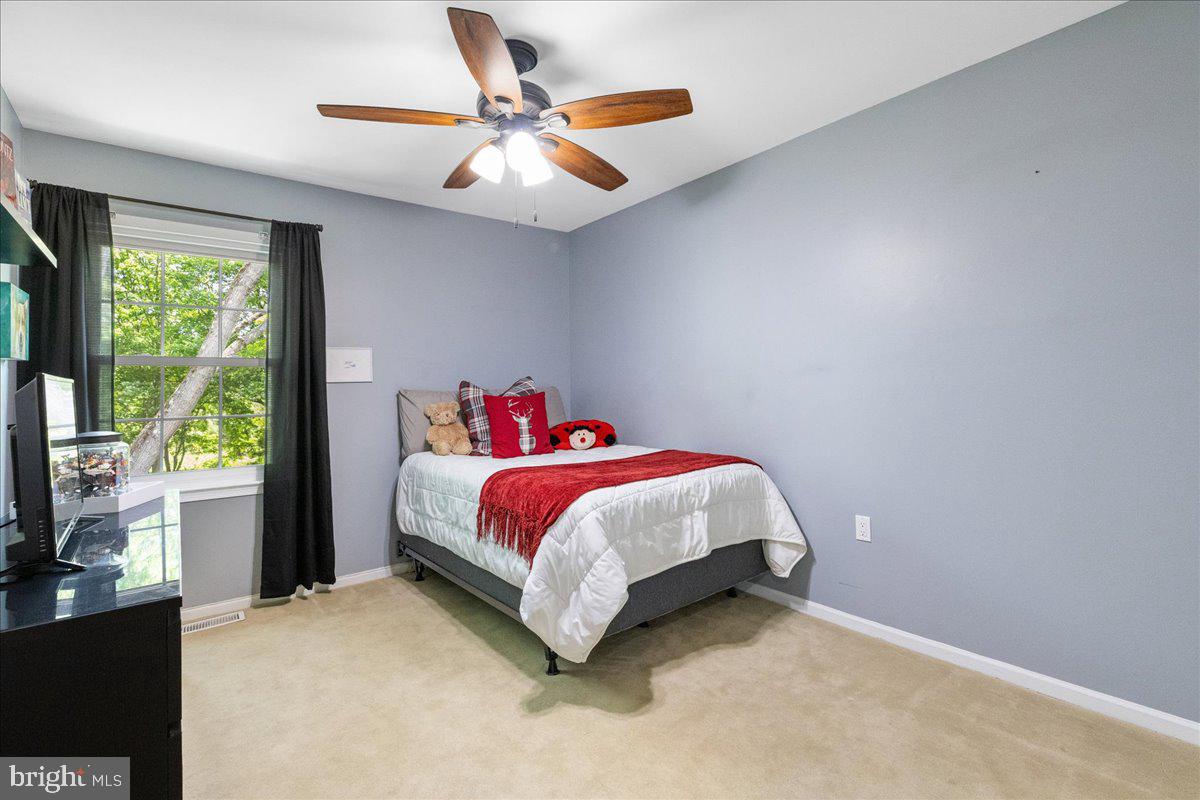3 Strathmore Place Princeton Junction, NJ 08550 - Photo 19 of 29 a bedroom with a bed and a large window