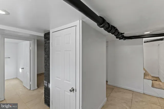 a view of hallway with walk in closet
