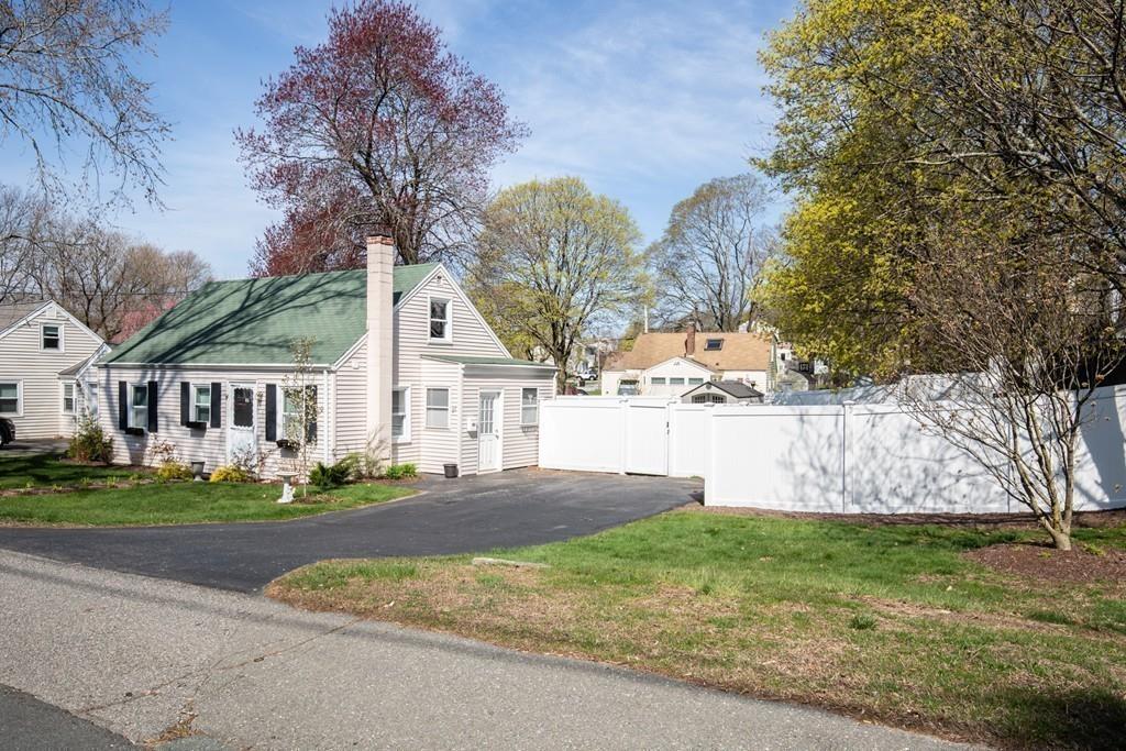 21 Forest Street Peabody, MA 01960 - Photo 3 of 29 a front view of a house with garden