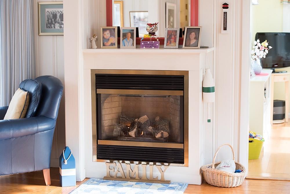 55 Langsford Road Kennebunkport, ME 04046 - Photo 10 of 31 Gas fireplace in the open layout...