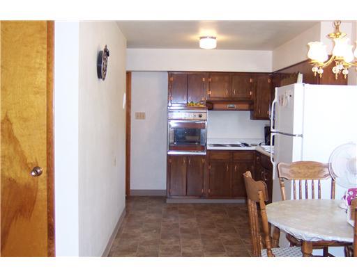 144 Morgan Hill Road Cuddy, PA 15031 - Photo 5 of 18 Kitchen. Clean 9x17 eat-in-kitchen has new vinyl flooring.