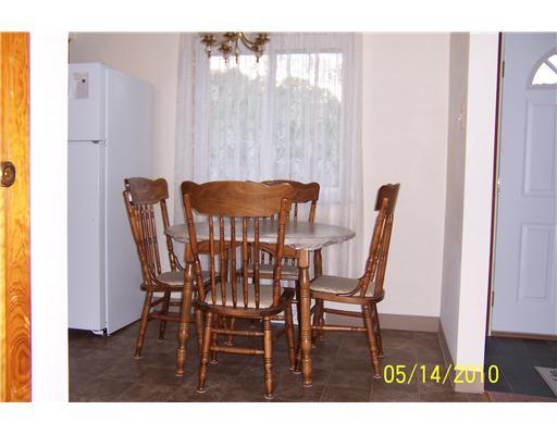 144 Morgan Hill Road Cuddy, PA 15031 - Photo 6 of 18 Kitchen. Dining area in the eat-in-kitchen is near the front entrance area.