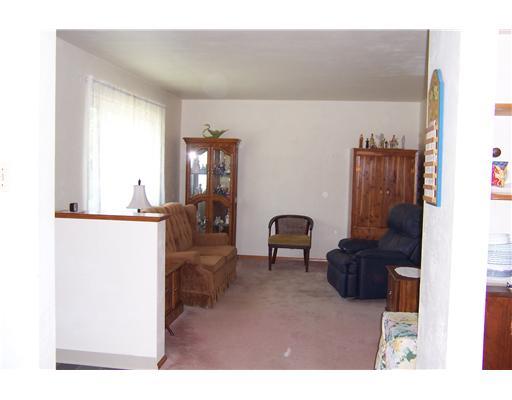 144 Morgan Hill Road Cuddy, PA 15031 - Photo 7 of 18 Living Room. 18x12 living room has a new large window with marble seals and plaster walls