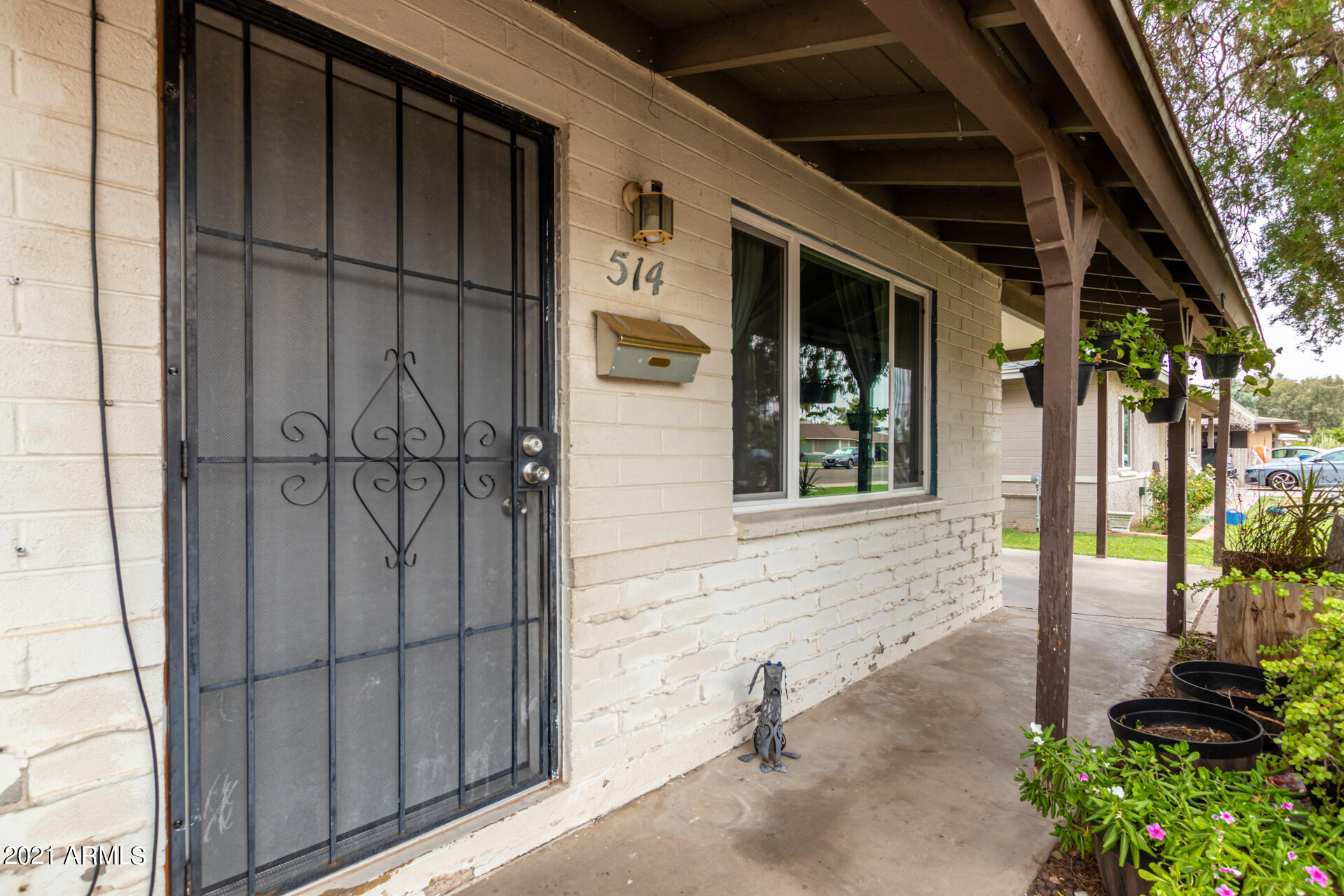 512 North Drew Street West Mesa, AZ 85201 - Photo 27 of 43 514 front door
