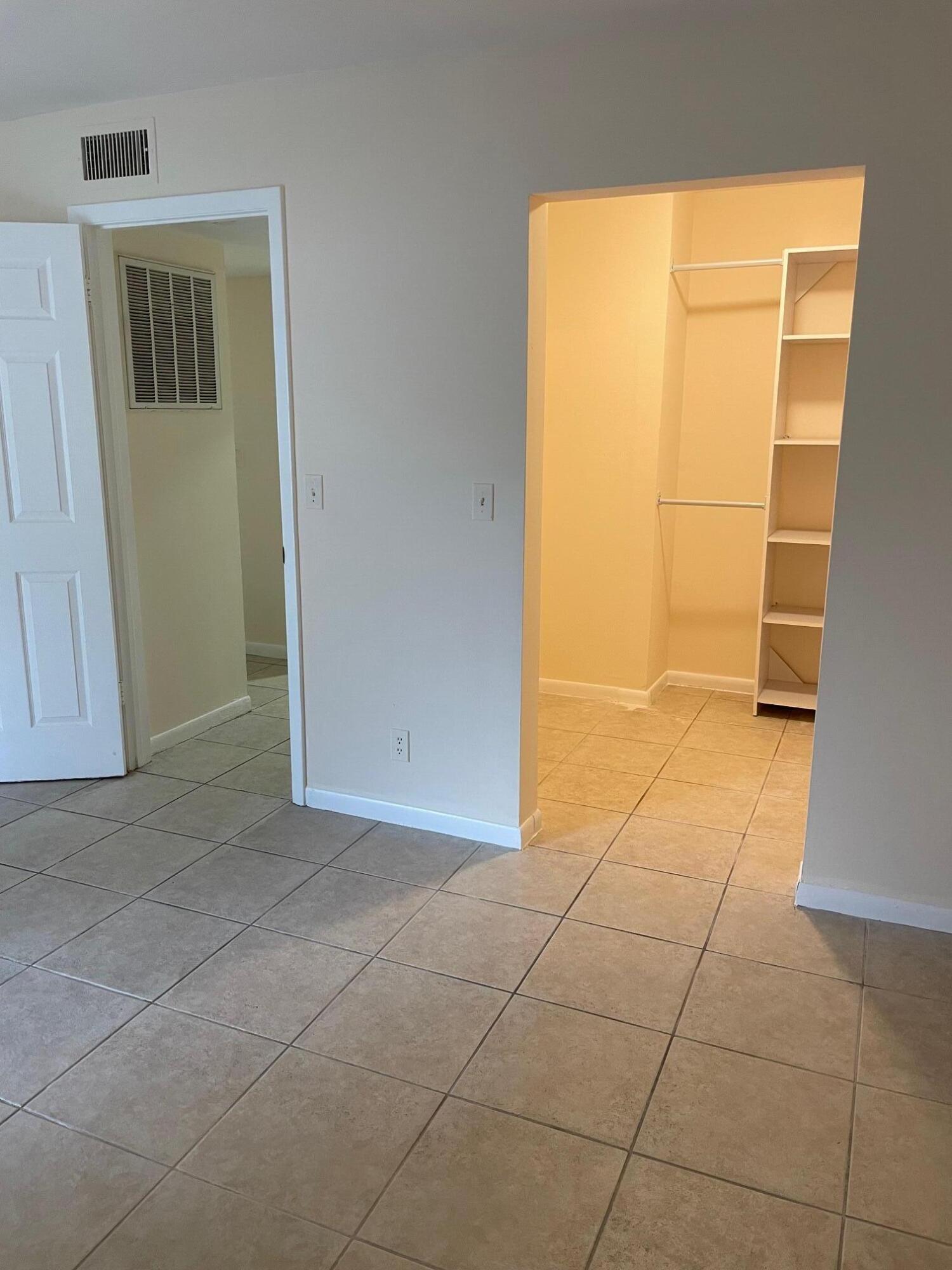 618 Northwest 13th Street, Unit 14 Boca Raton, FL 33486 - Photo 9 of 11 spacious bed