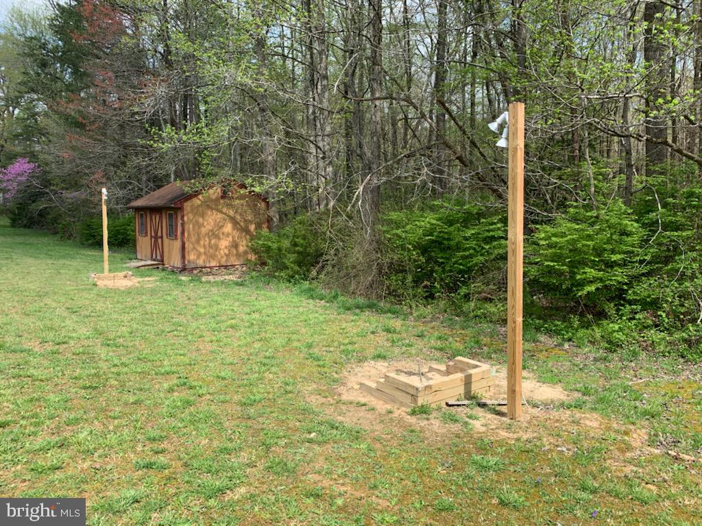 144 Buckner Road Bumpass, VA 23024 - Photo 39 of 46 Horse shoe pits with outdoor lighting