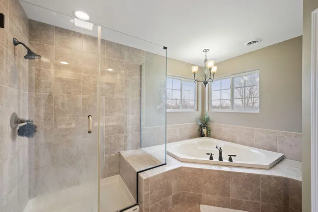 a bathroom with a sink a toilet and shower curtain
