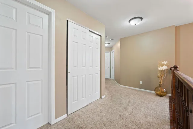 a bedroom with furniture and a gym equipment