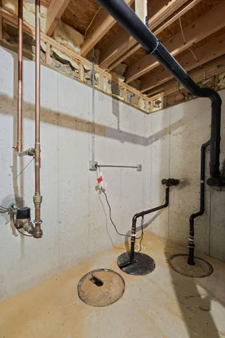 a view of a roof deck with table and chairs