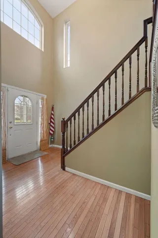 a view of entryway with wooden floor
