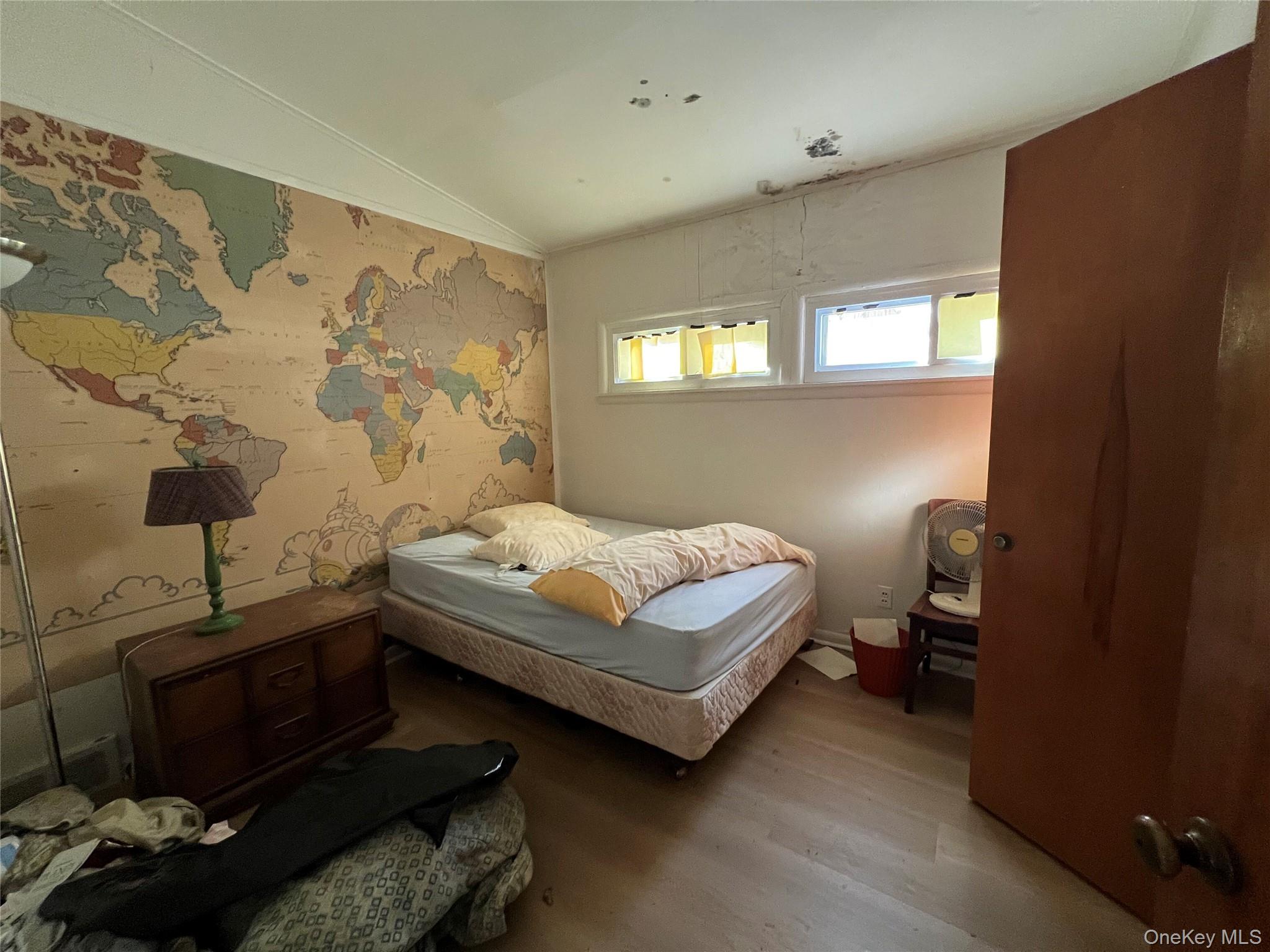 298 Old Albany Post Road Garrison, NY 10524 - Photo 11 of 18 a bedroom with a bed and a window