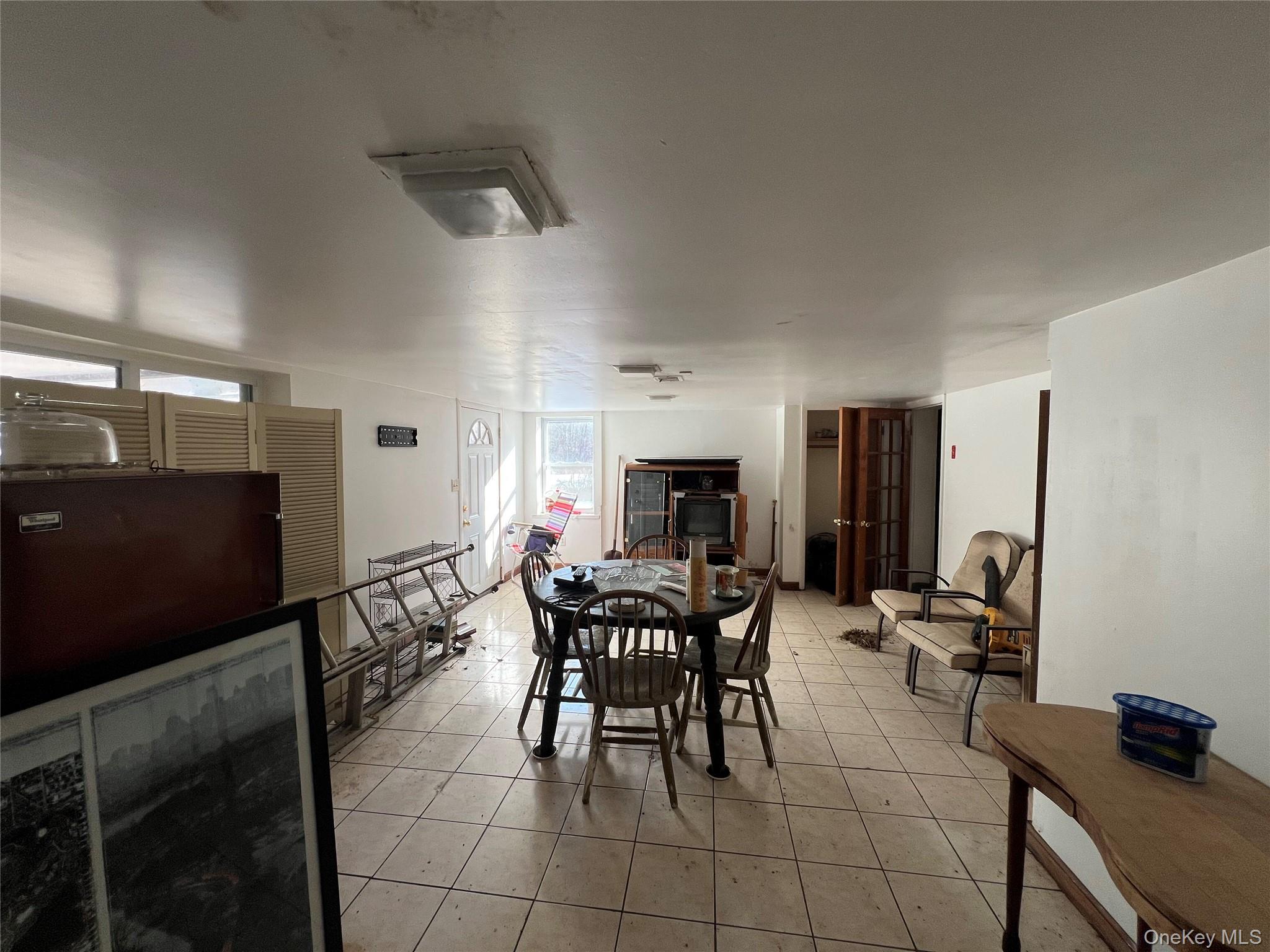 298 Old Albany Post Road Garrison, NY 10524 - Photo 13 of 18 a view of a dining room with furniture
