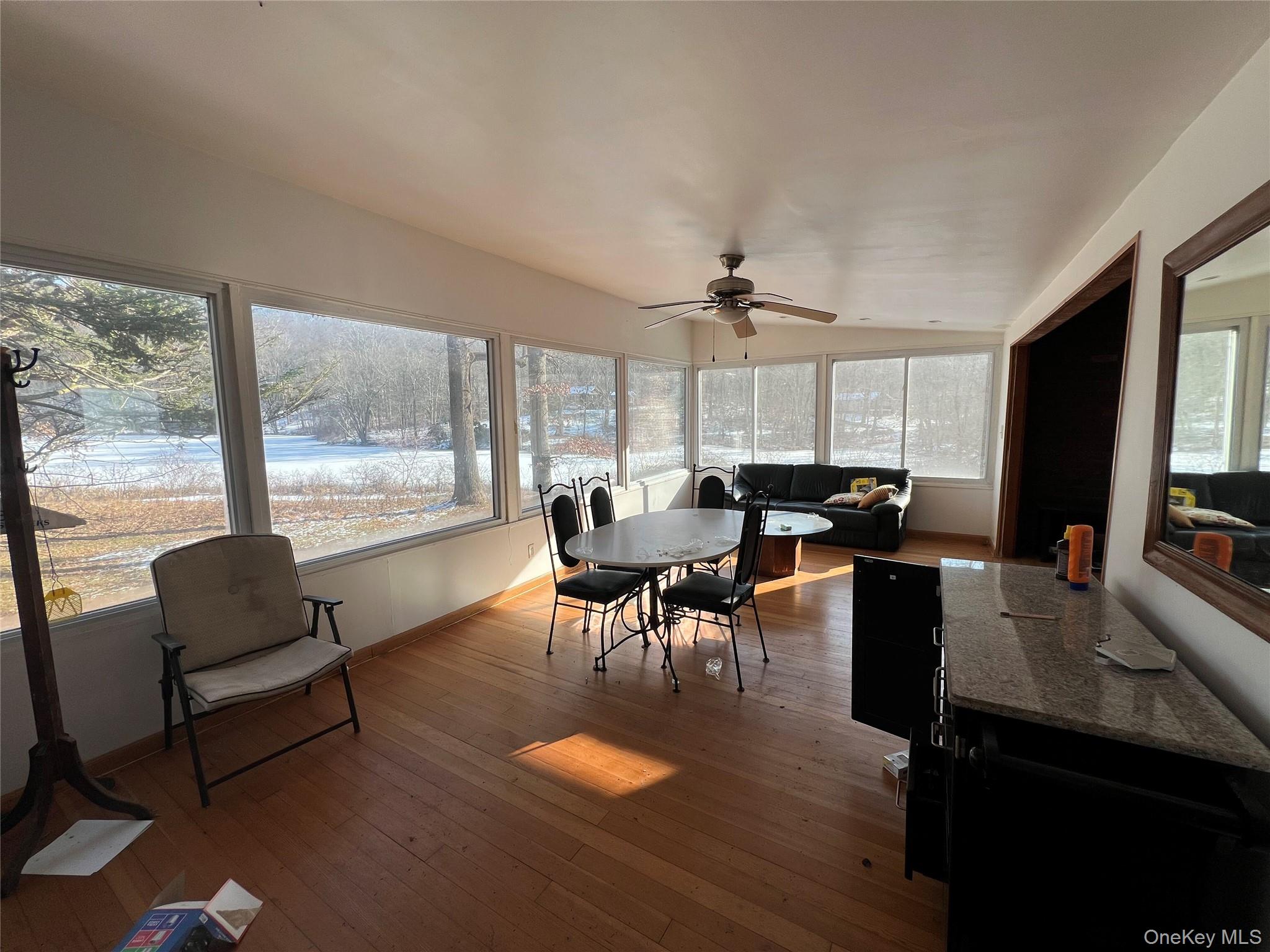 298 Old Albany Post Road Garrison, NY 10524 - Photo 6 of 18 a living room with furniture and a large window