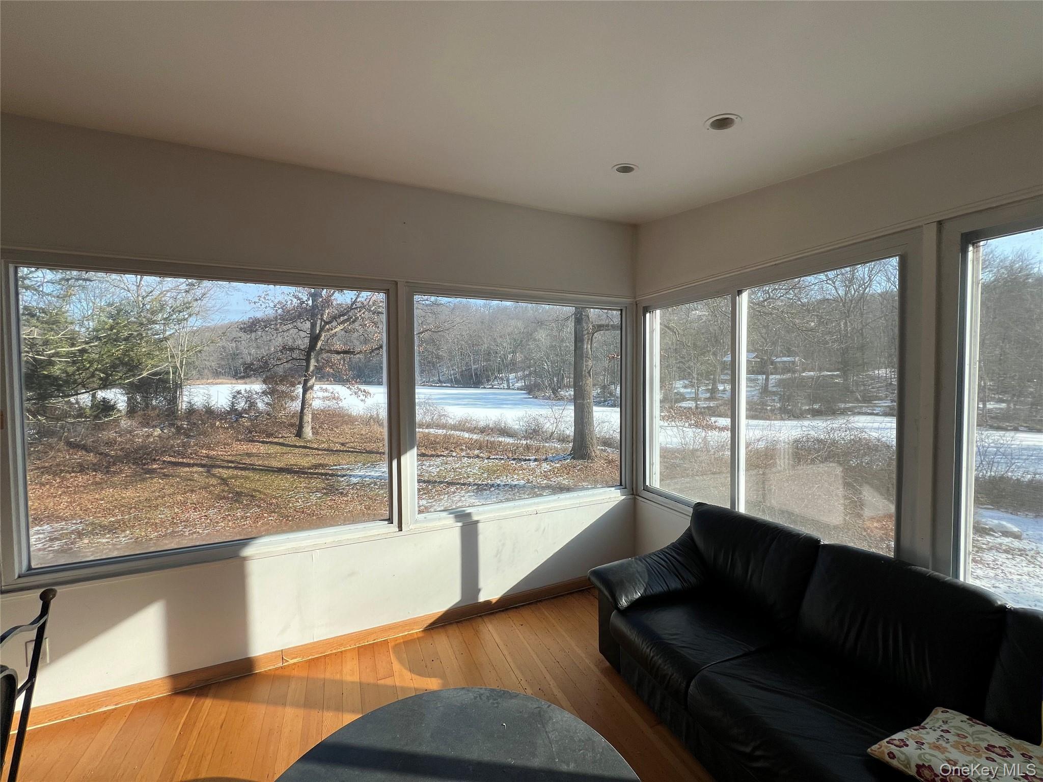 298 Old Albany Post Road Garrison, NY 10524 - Photo 8 of 18 a living room with a large window