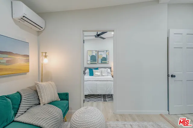 a living room with furniture and a table