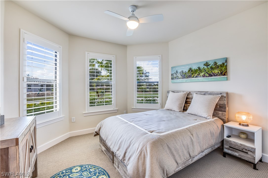 16495 Windsor Way Alva, FL 33920 - Photo 11 of 19 a bedroom with a bed and a window