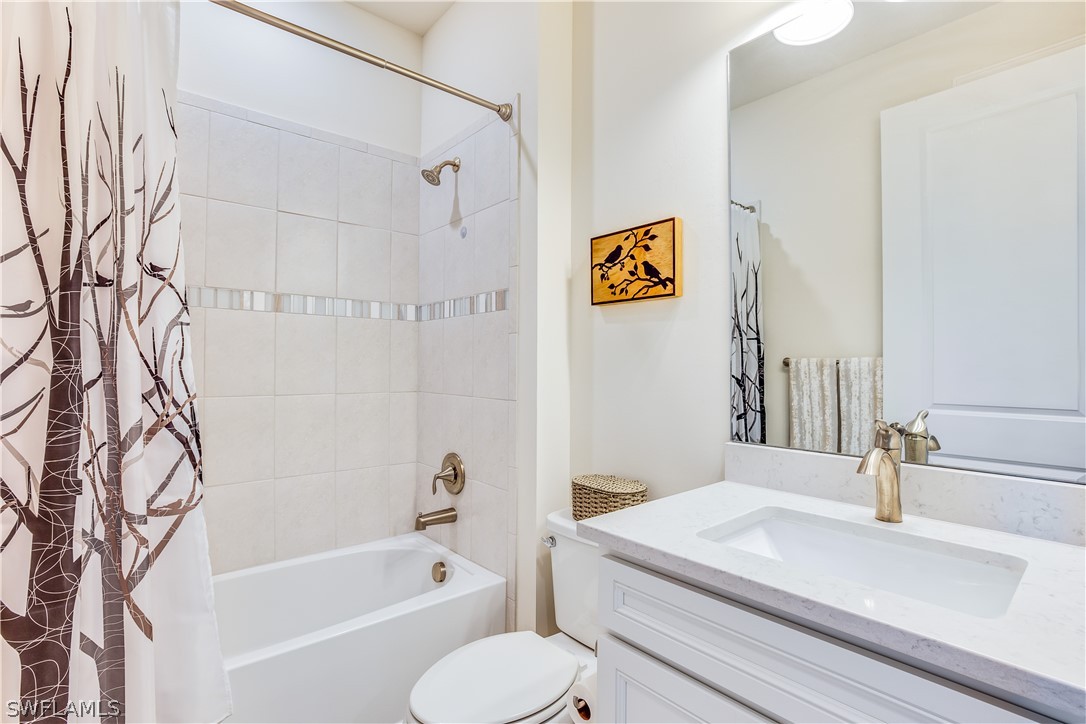 16495 Windsor Way Alva, FL 33920 - Photo 12 of 19 a bathroom with a sink a toilet and bathtub