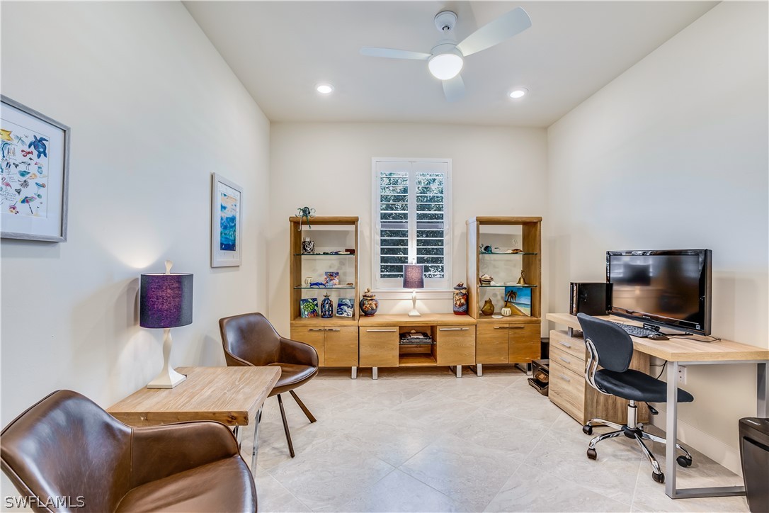 16495 Windsor Way Alva, FL 33920 - Photo 16 of 19 a workspace with furniture and a large window