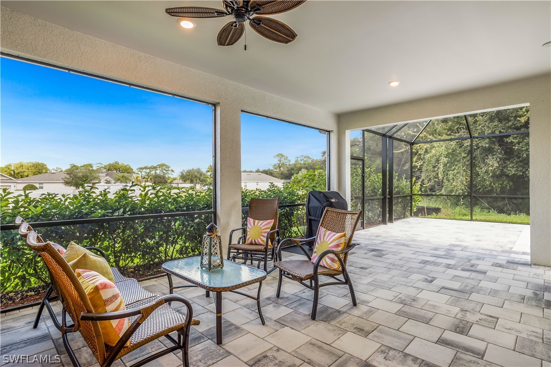 16495 Windsor Way Alva, FL 33920 - Photo 19 of 19 a view of a chairs and table in patio