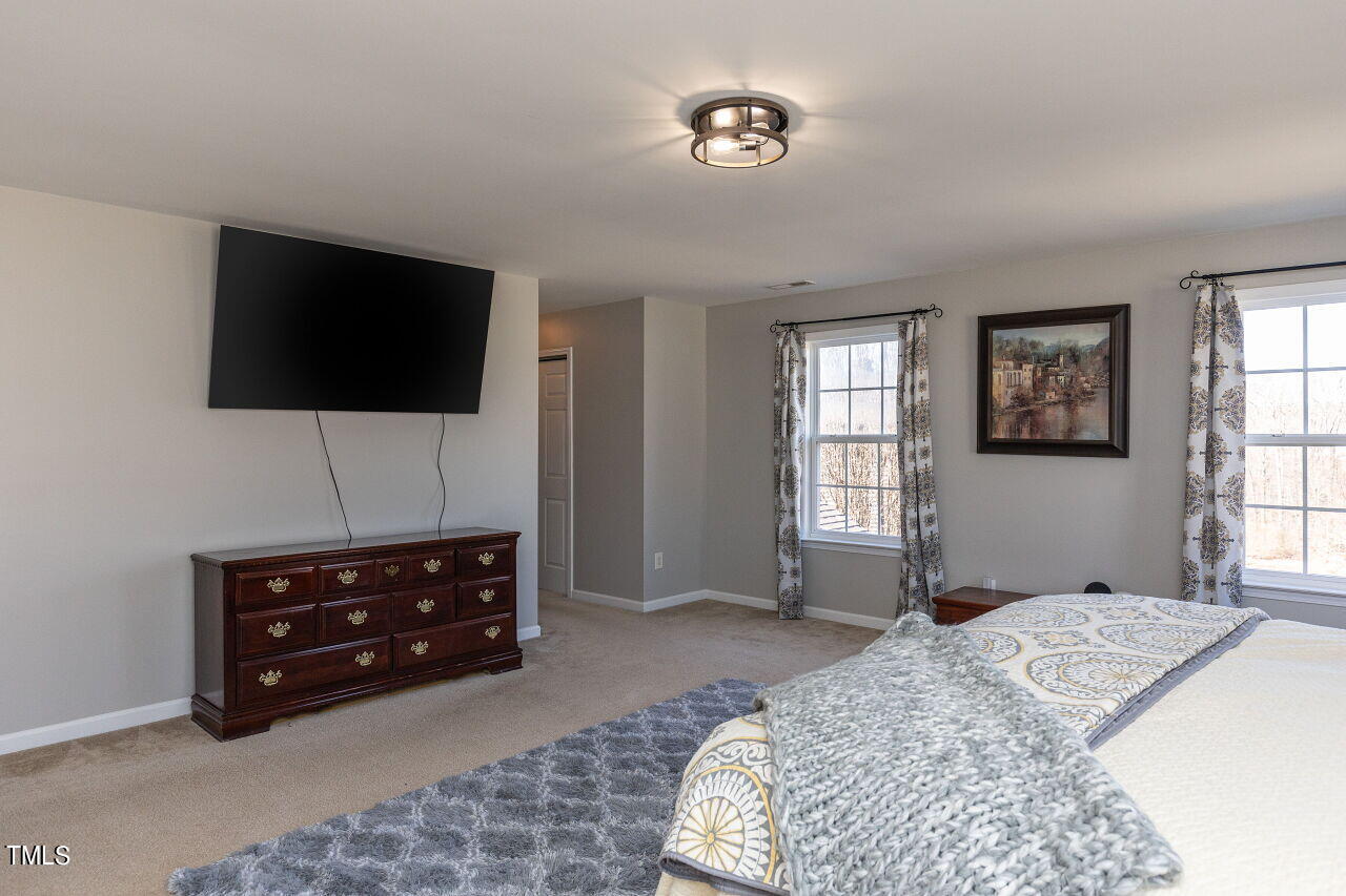 100 Acentala Court Raleigh, NC 27603 - Photo 24 of 41 024-1280x960-master-bedroom
