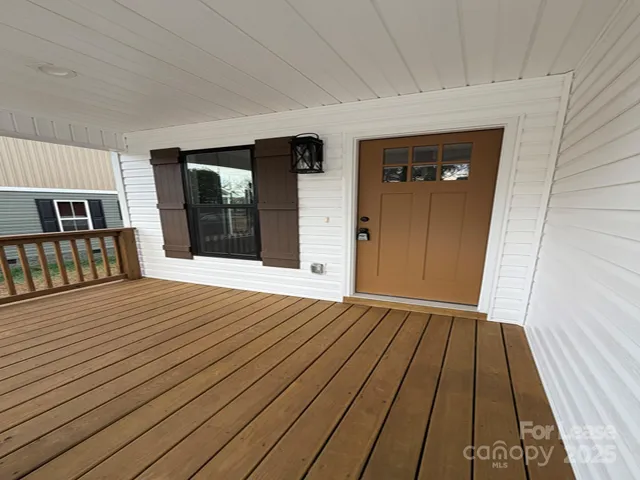 a view of a house with wooden floor