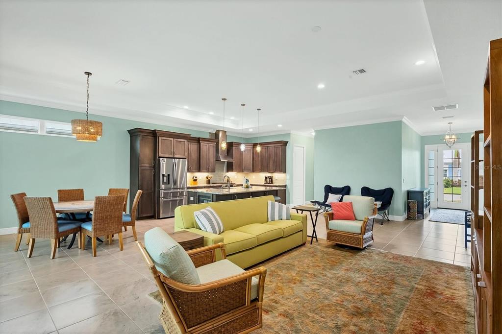 8936 Scallop Way Placida, FL 33946 - Photo 11 of 46 a living room with furniture kitchen view and a wooden floor