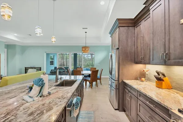 a kitchen with granite countertop lots of counter top space