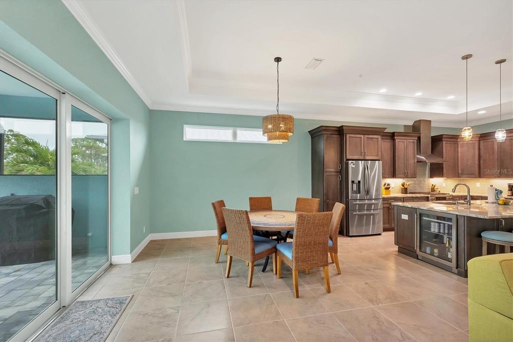 8936 Scallop Way Placida, FL 33946 - Photo 19 of 46 a view of a dining room with furniture