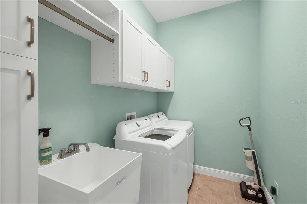 8936 Scallop Way Placida, FL 33946 - Photo 32 of 46 a utility room with dryer and washer