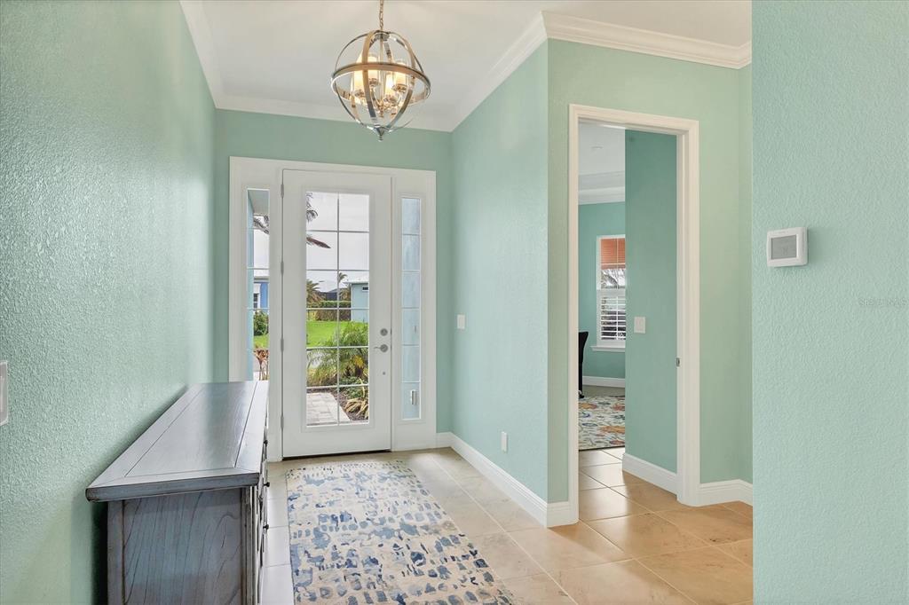 8936 Scallop Way Placida, FL 33946 - Photo 7 of 46 wooden floor in an empty room with a window