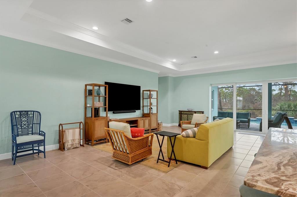 8936 Scallop Way Placida, FL 33946 - Photo 9 of 46 a living room with furniture and a flat screen tv