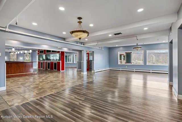 a bathroom with a double vanity sink mirror and double