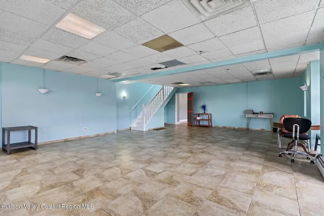 a kitchen with a stove and a refrigerator
