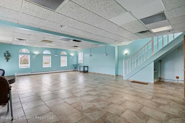 a kitchen with stainless steel appliances granite countertop a stove and a sink