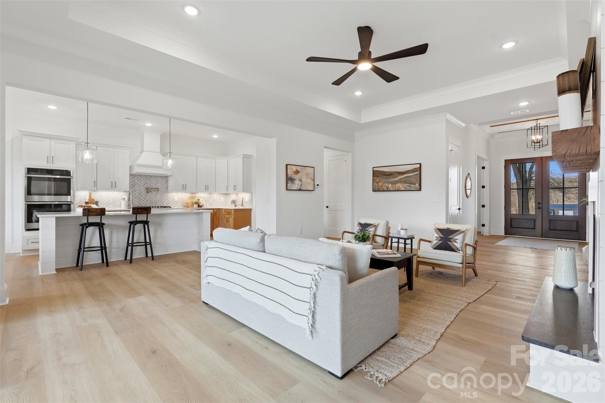 4748 Polk Ford Road Stanfield, NC 28163 - Photo 11 of 47 a living room with furniture and kitchen view
