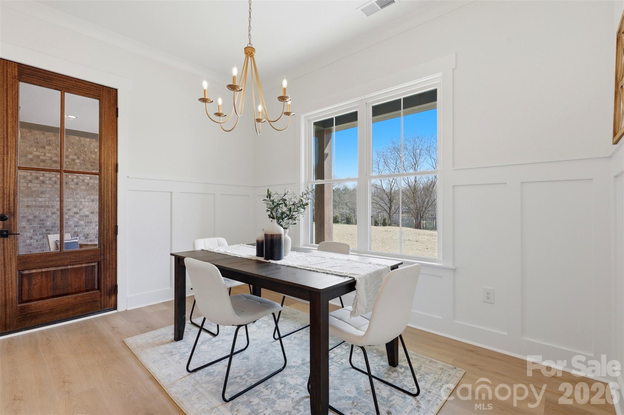 4748 Polk Ford Road Stanfield, NC 28163 - Photo 19 of 47 a view of a dining room with furniture window and outside view
