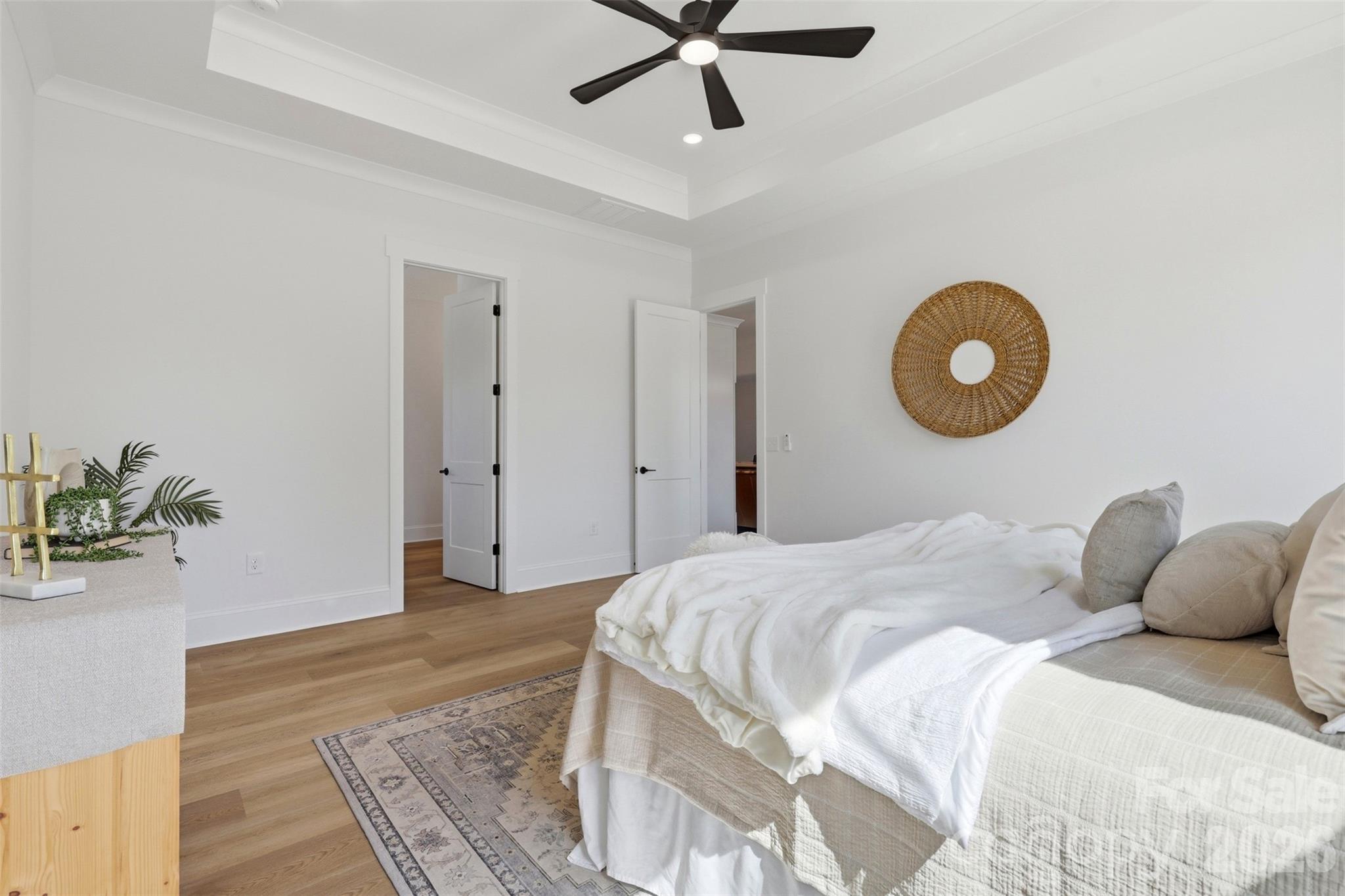 4748 Polk Ford Road Stanfield, NC 28163 - Photo 25 of 47 a bedroom with a bed and cabinets