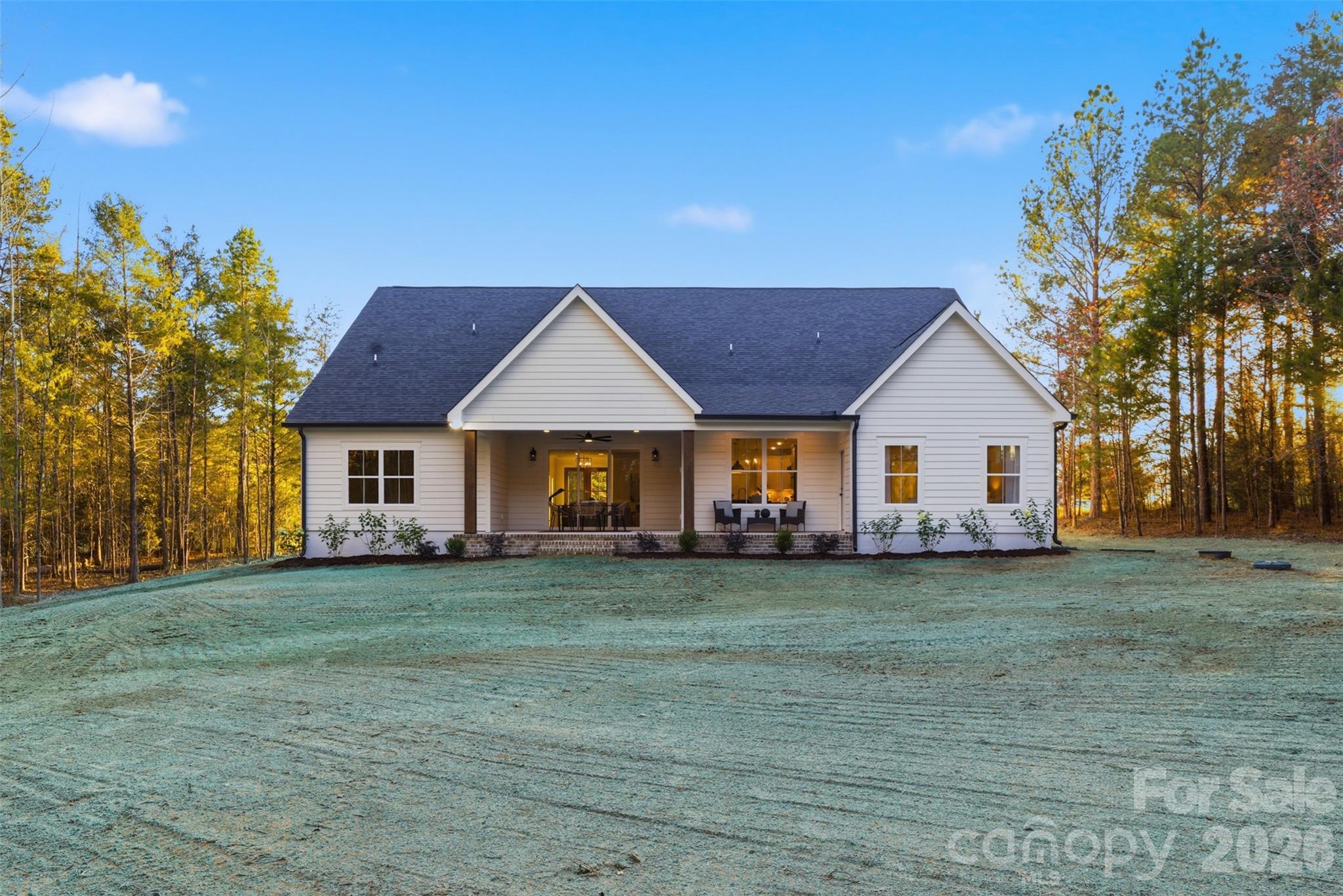 4748 Polk Ford Road Stanfield, NC 28163 - Photo 47 of 47 a view of a house with a yard