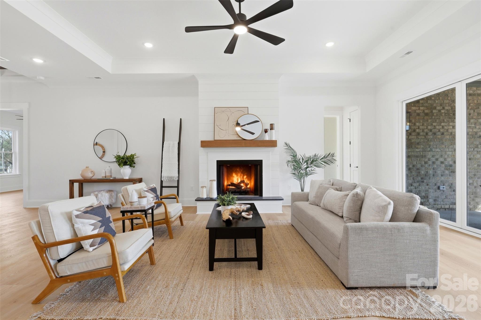 4748 Polk Ford Road Stanfield, NC 28163 - Photo 10 of 47 a living room with furniture and a fireplace